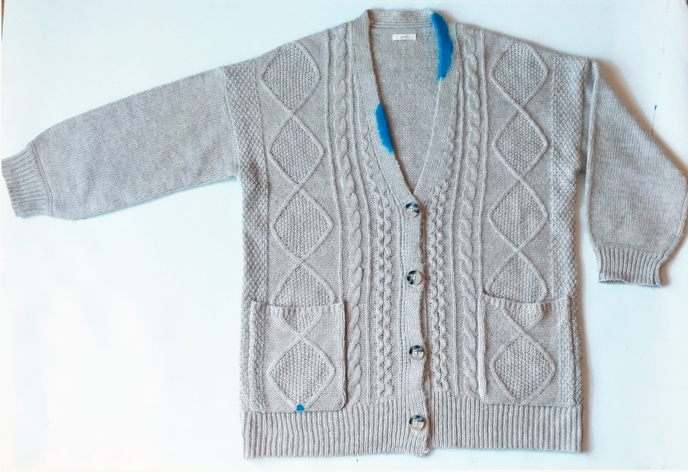 Cárdigan gris claro. 55€