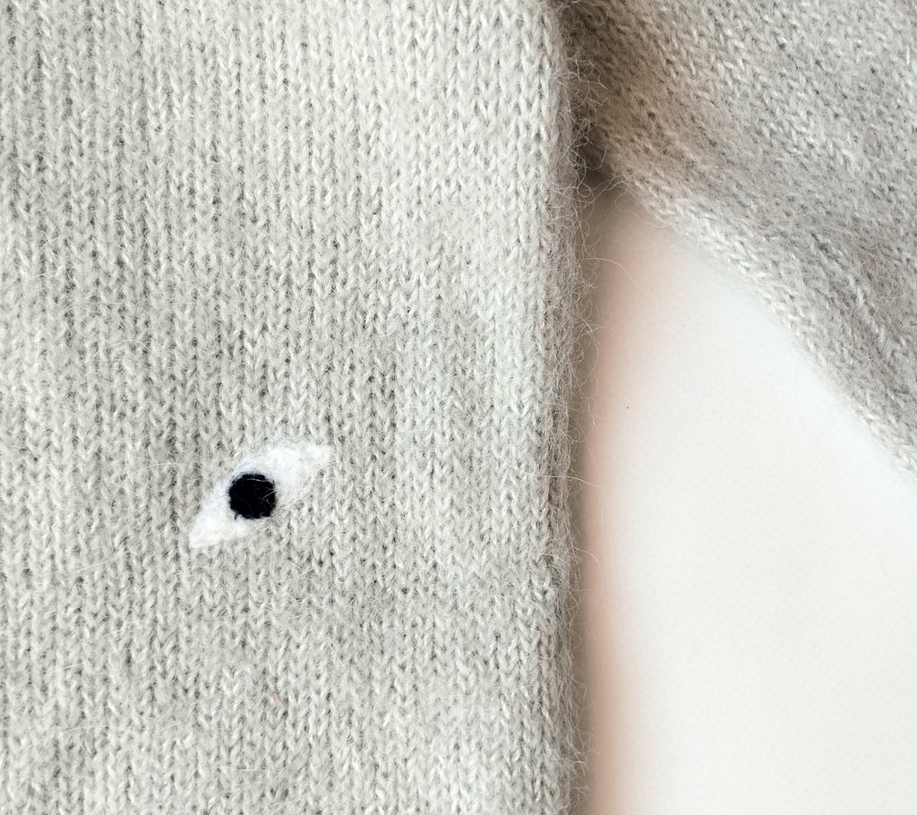 Cárdigan ojos. 50€