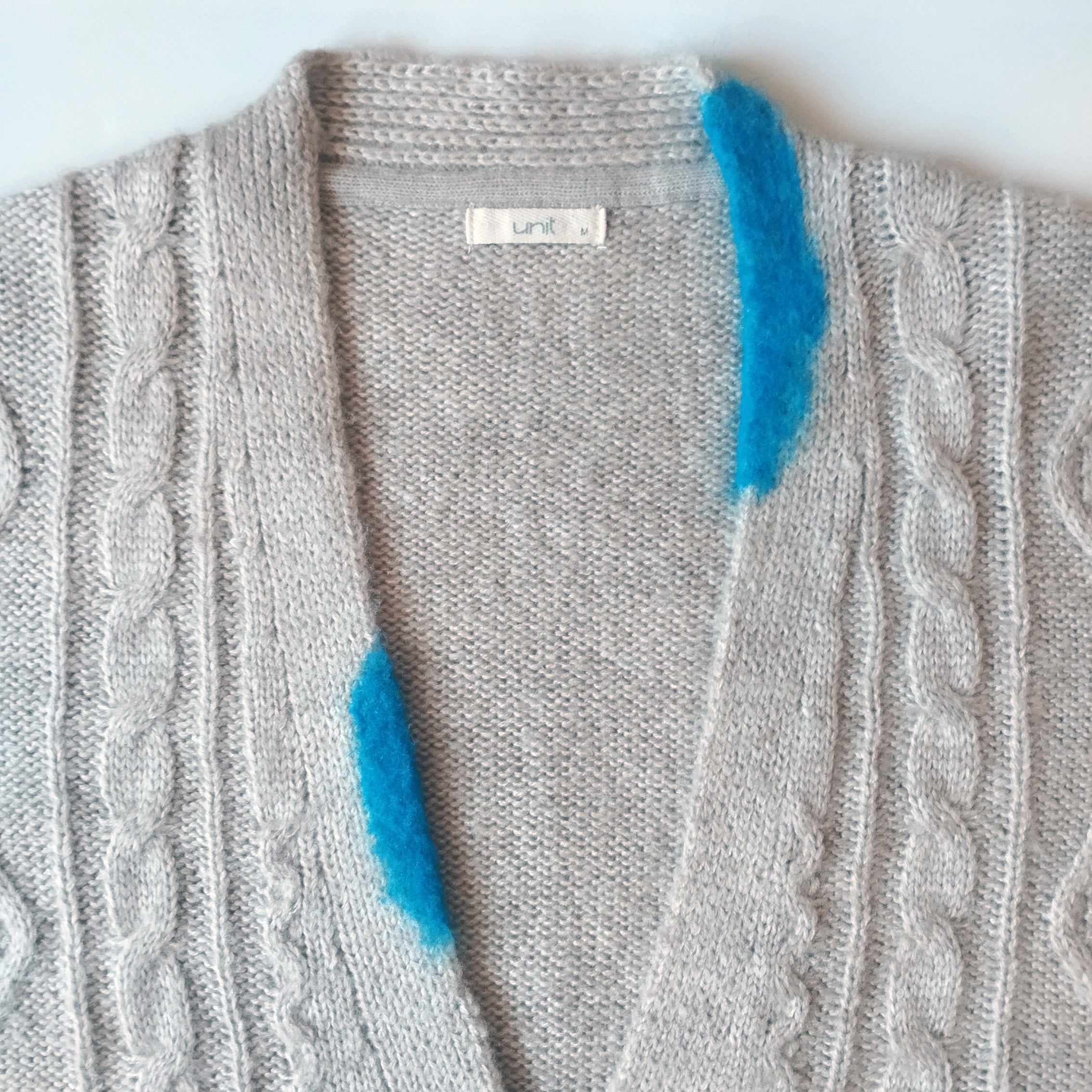 Cárdigan gris claro. 55€