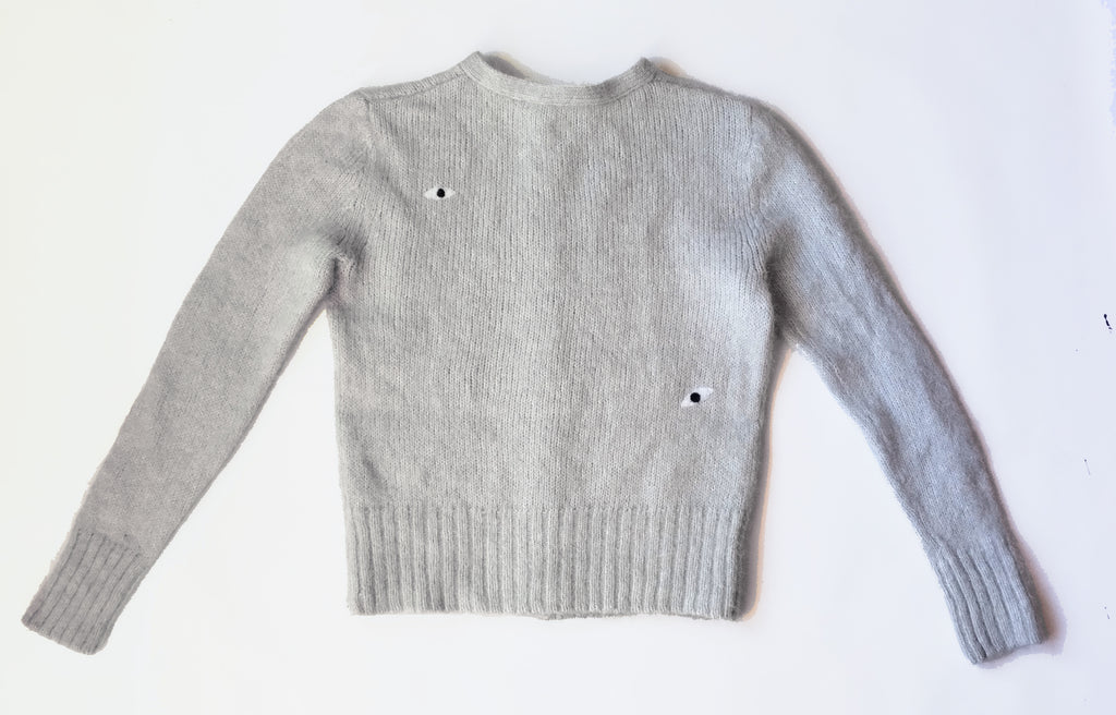 Cárdigan ojos. 50€