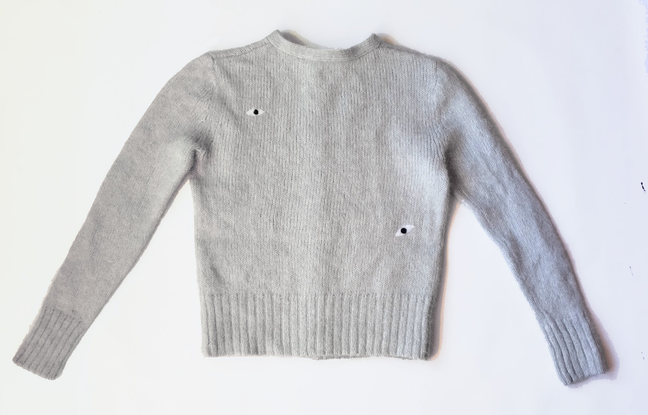 Cárdigan ojos. 50€