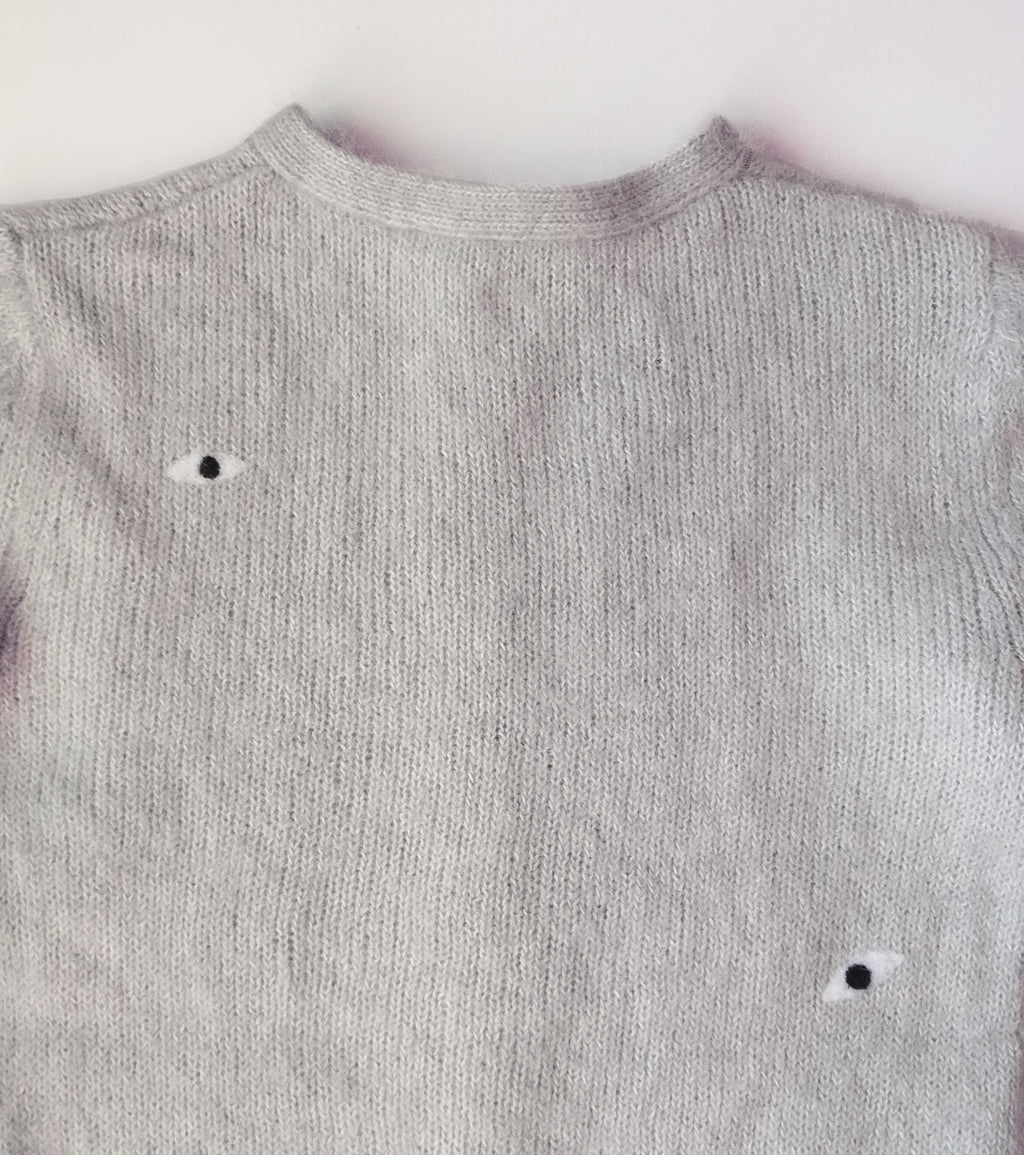 Cárdigan ojos. 50€
