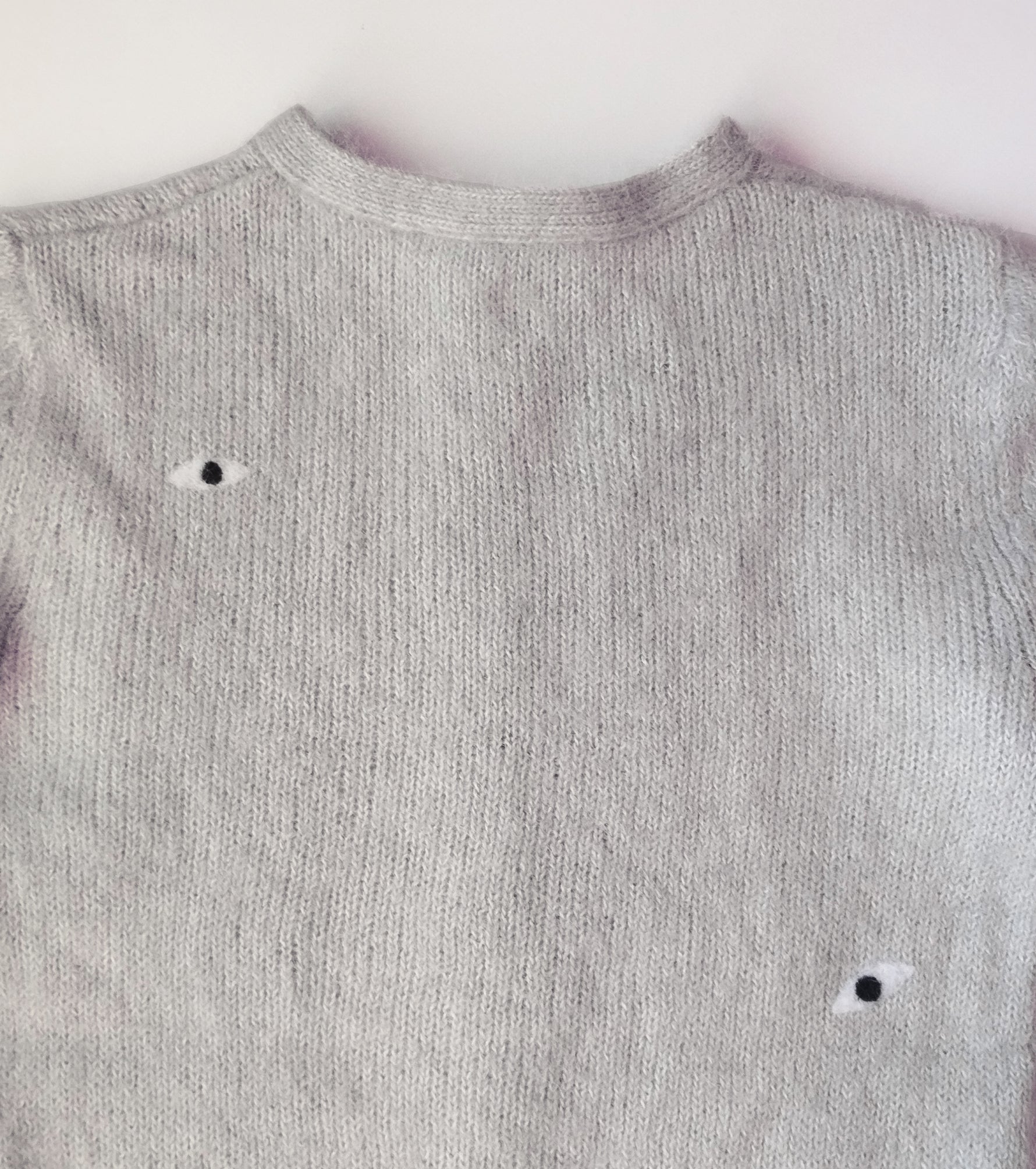 Cárdigan ojos. 50€