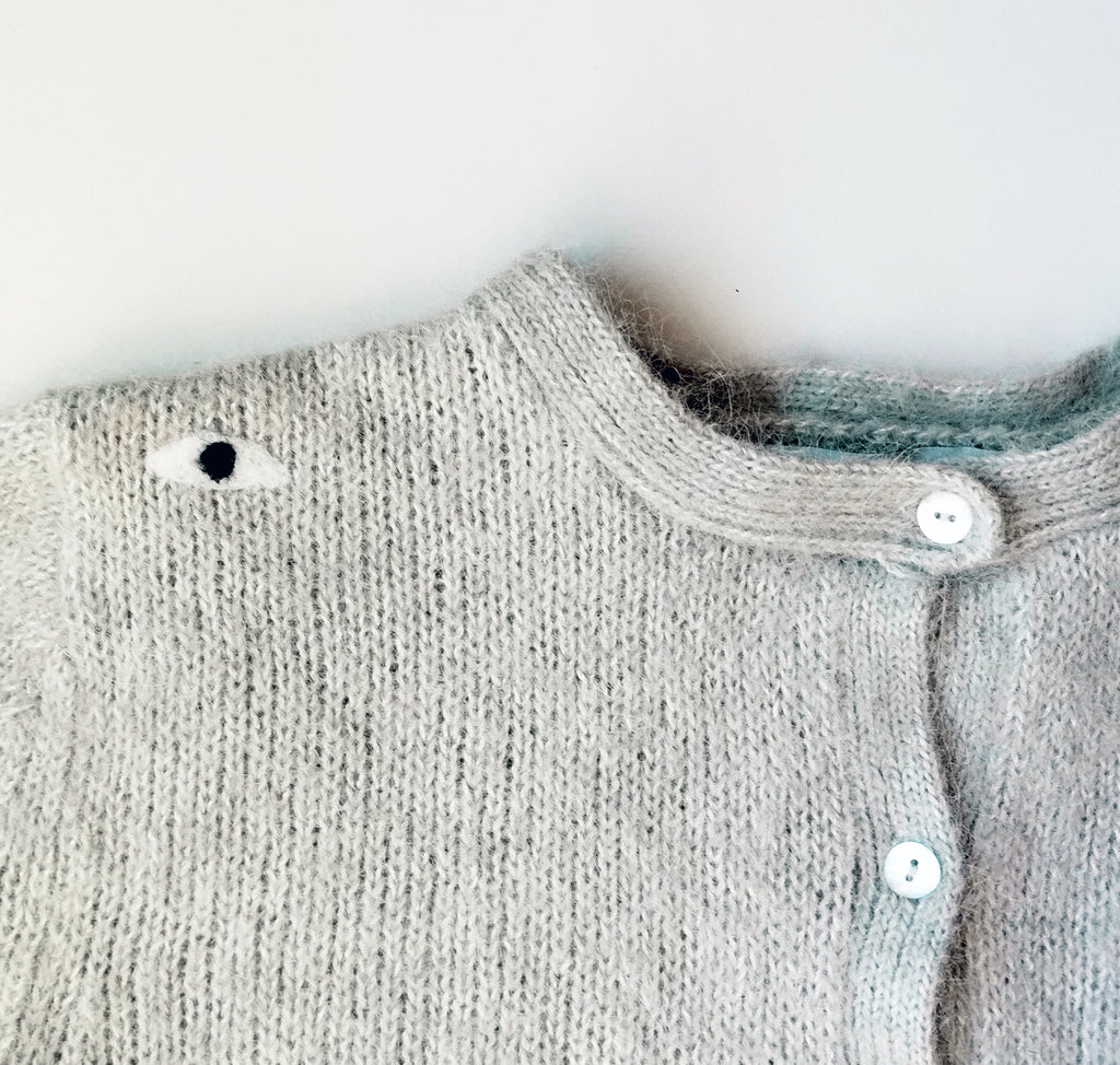 Cárdigan ojos. 50€