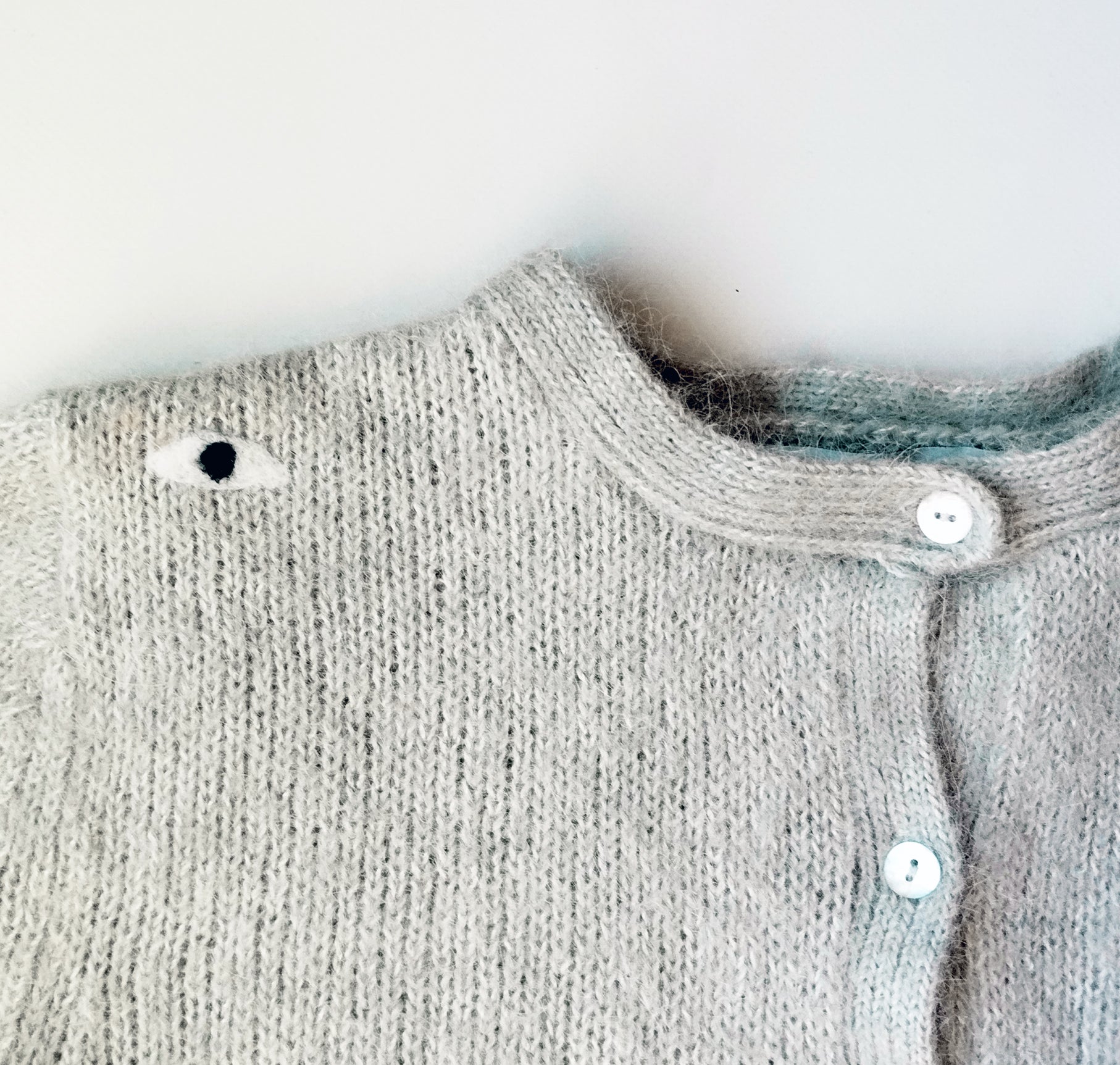 Cárdigan ojos. 50€