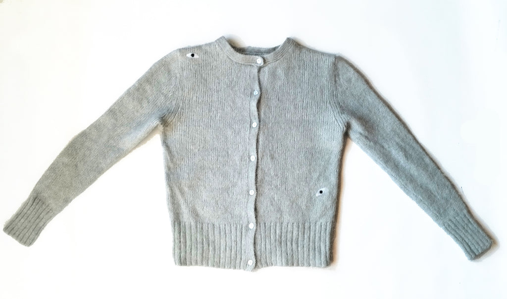 Cárdigan ojos. 50€