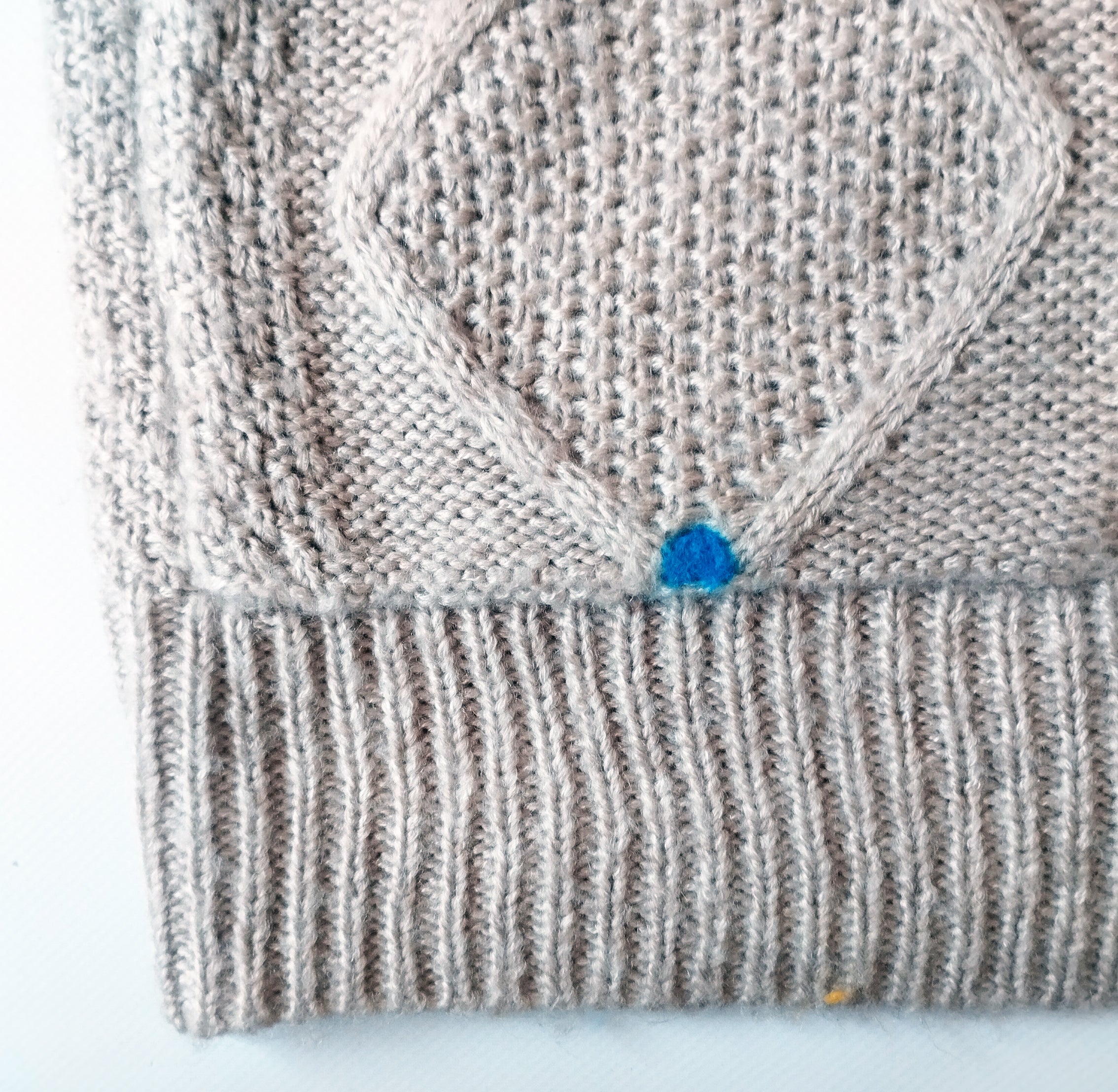 Cárdigan gris claro. 55€