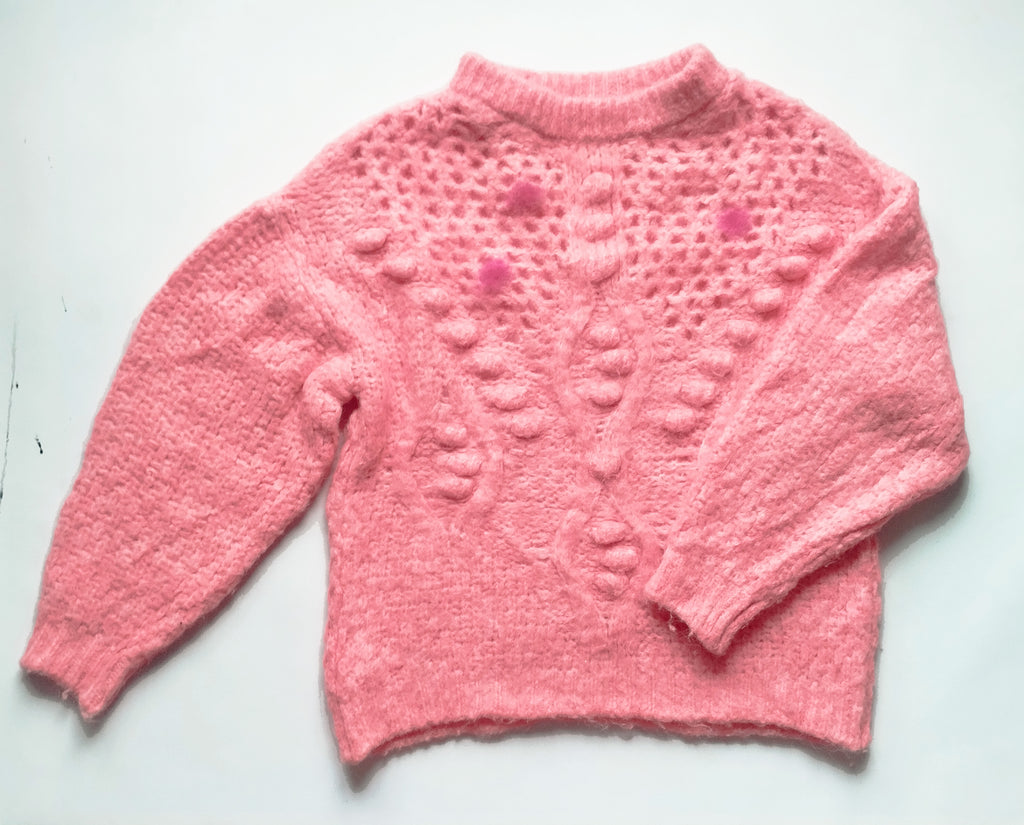 Suéter rosa grueso. 45€