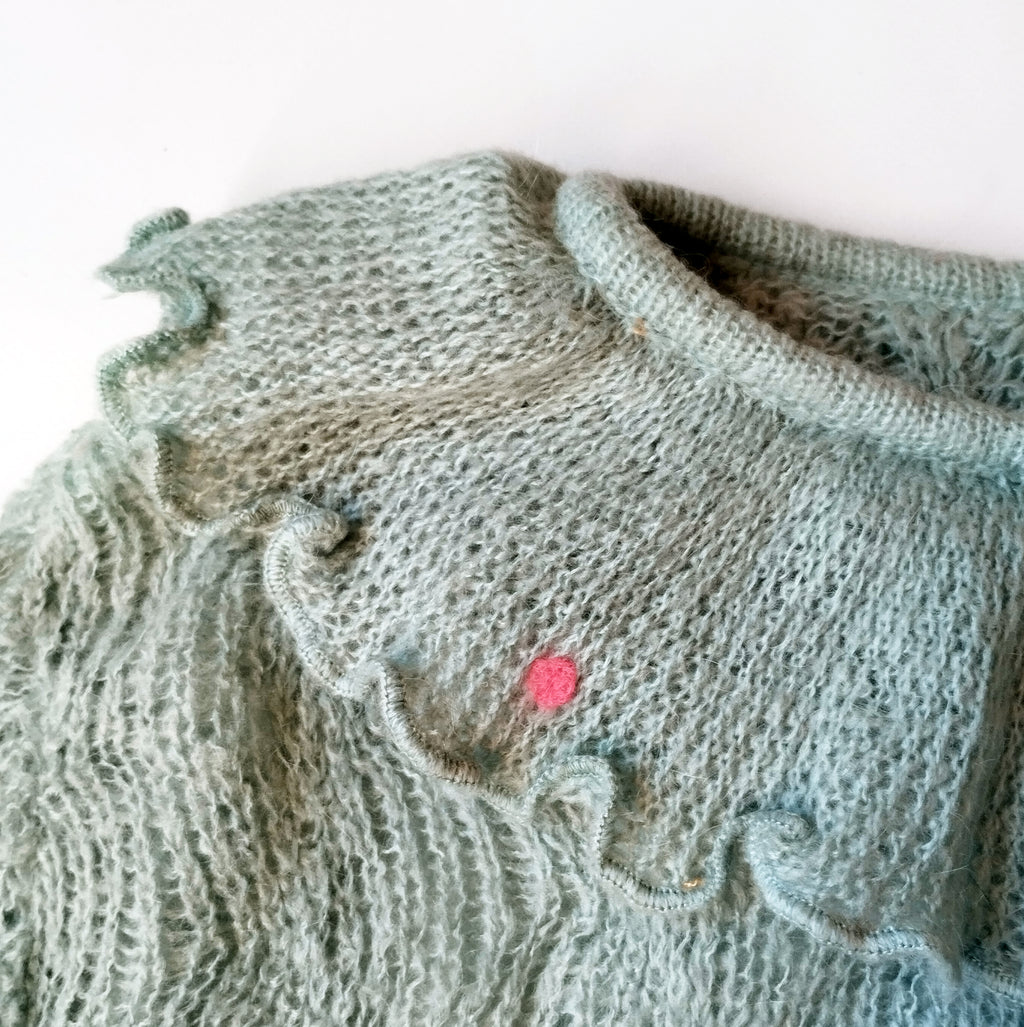 Suéter con volante. 45€