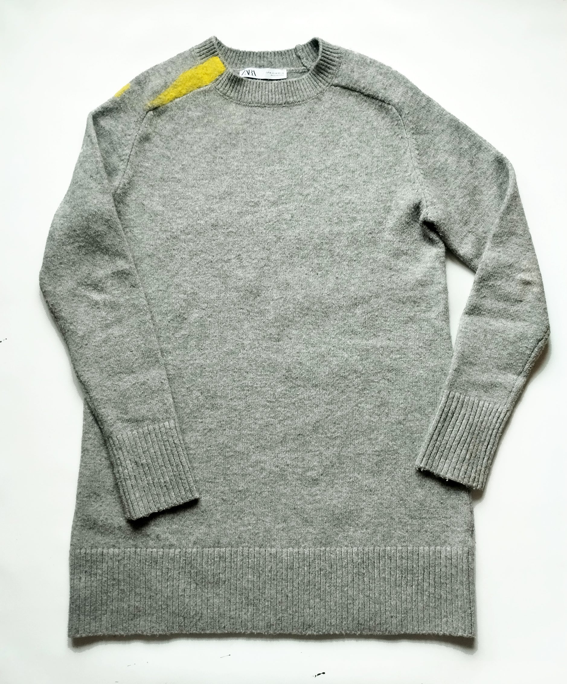 Suéter/vestido gris. 45€